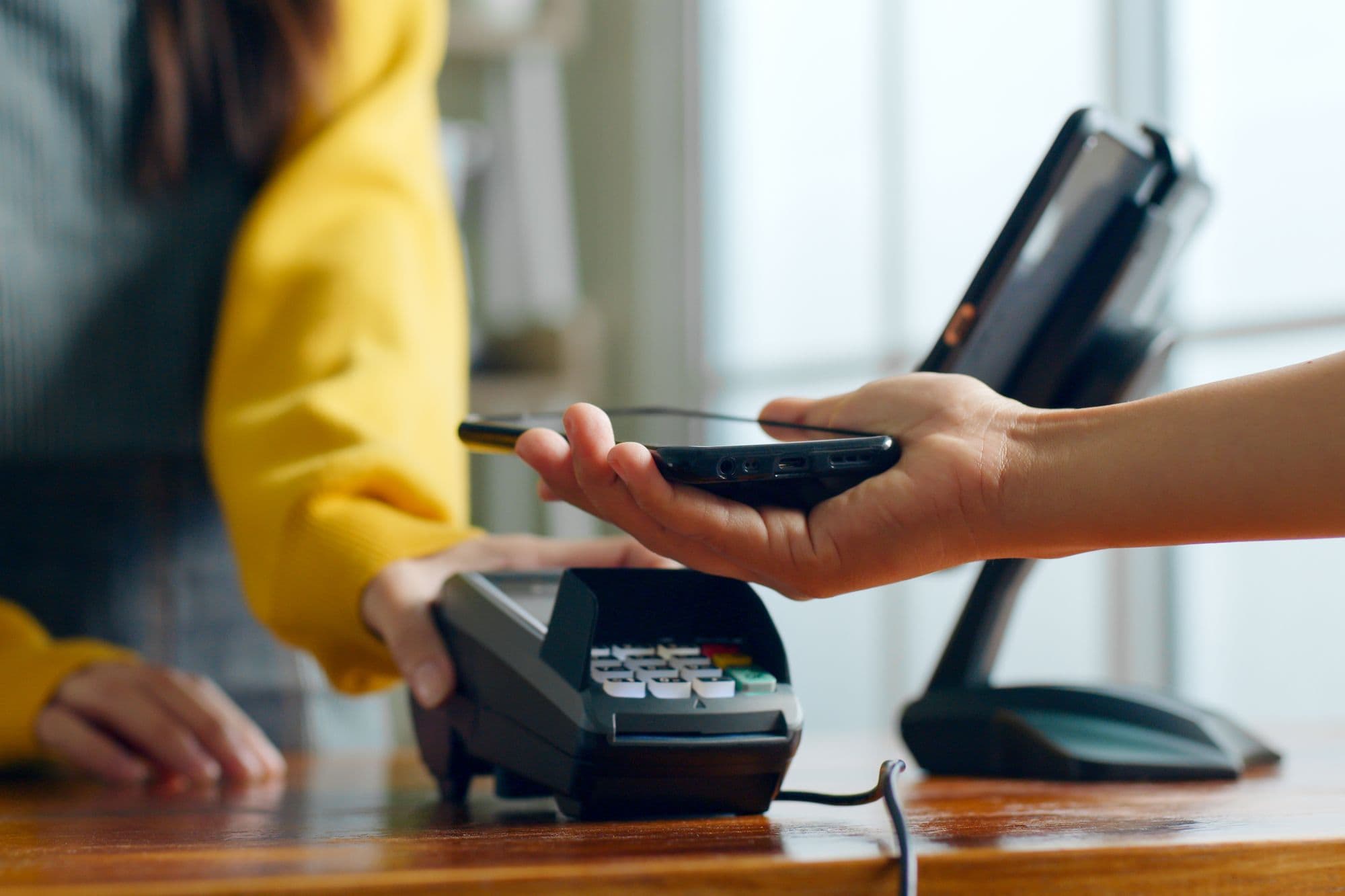 Payment with a phone on a payment terminal.