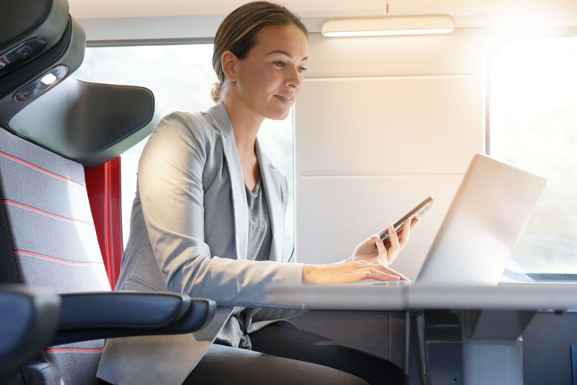 woman on plane on business trip
