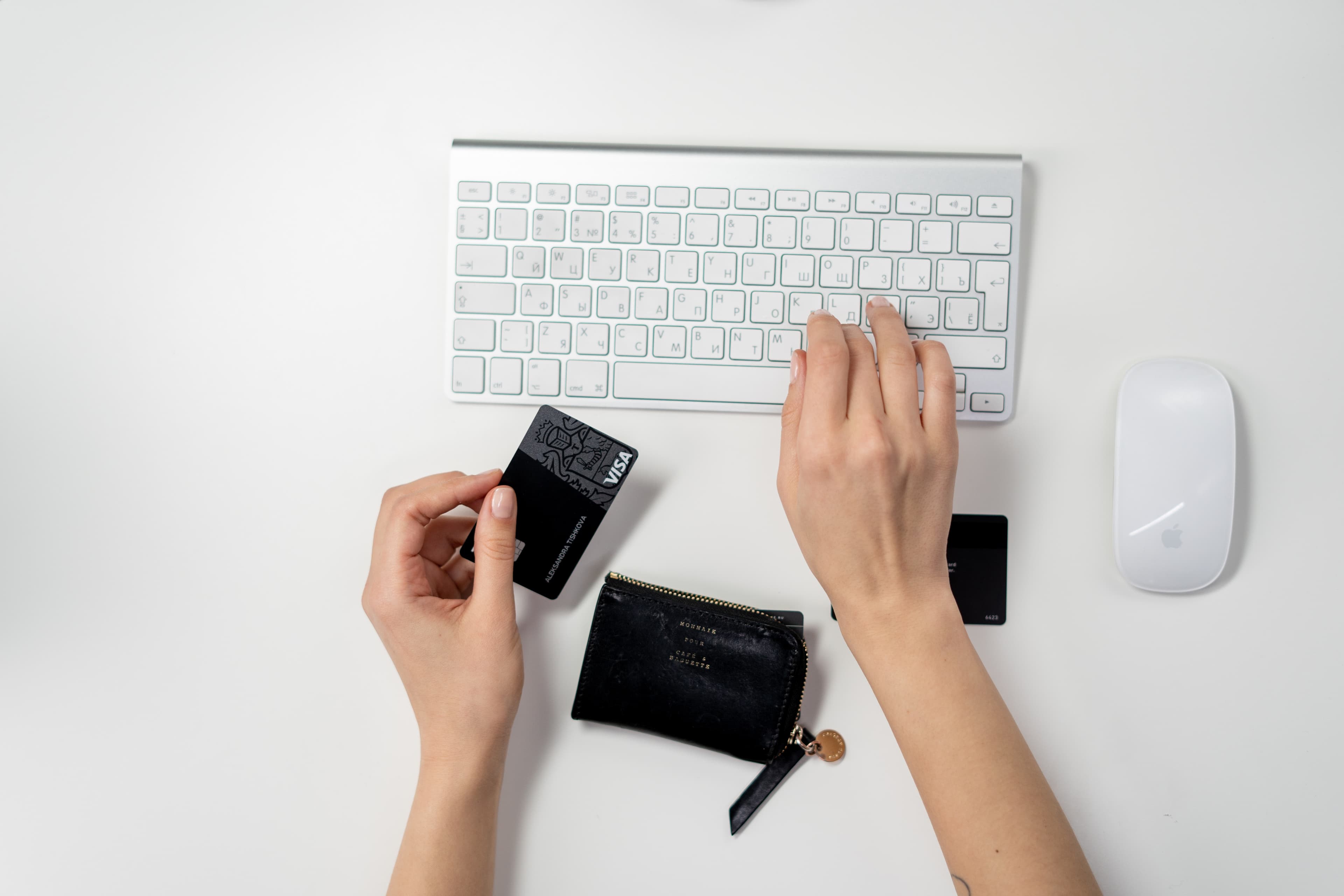 Person making a purchase online with a credit card