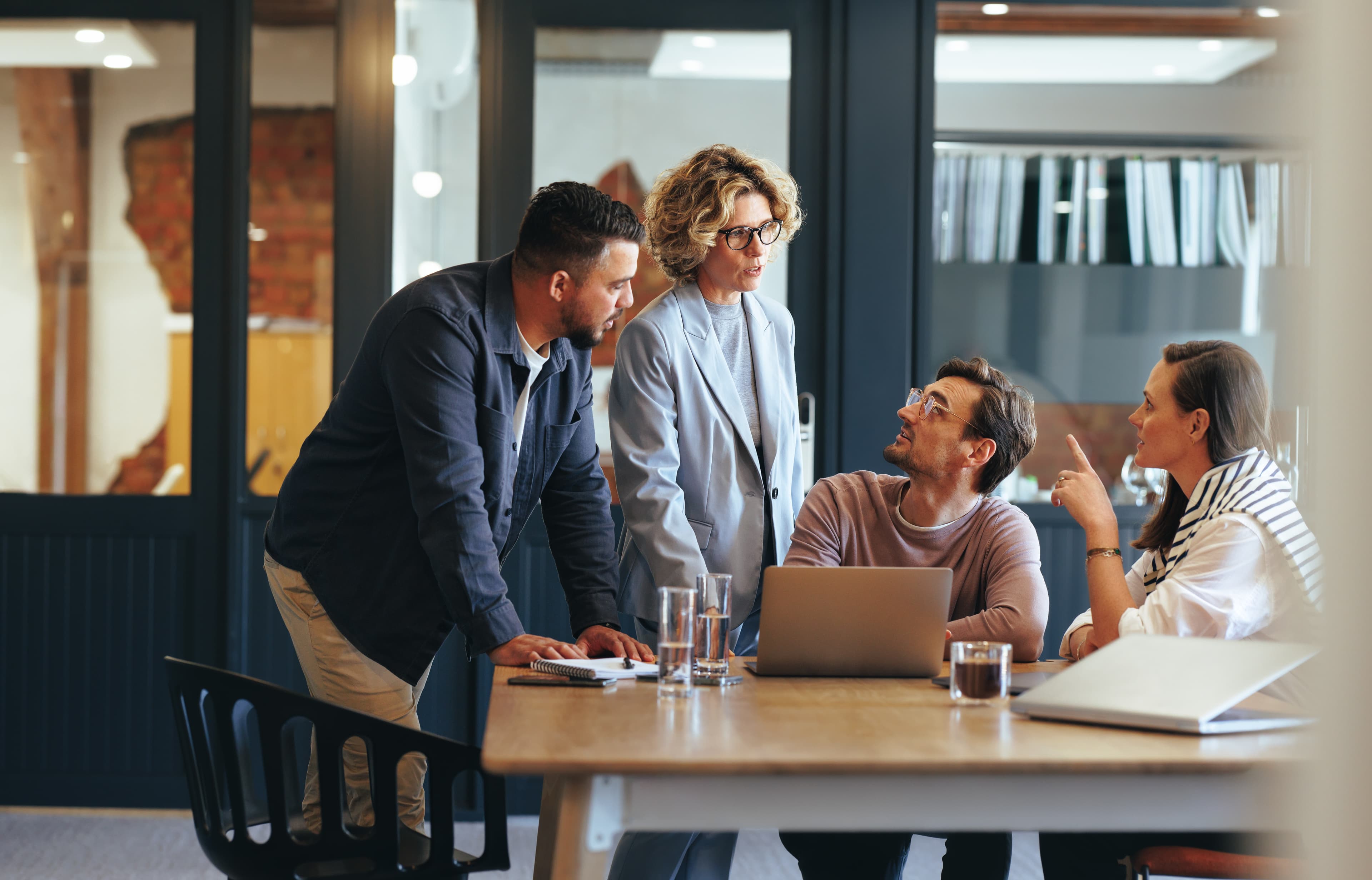 decision makers at a marketing agency discussing ad spend